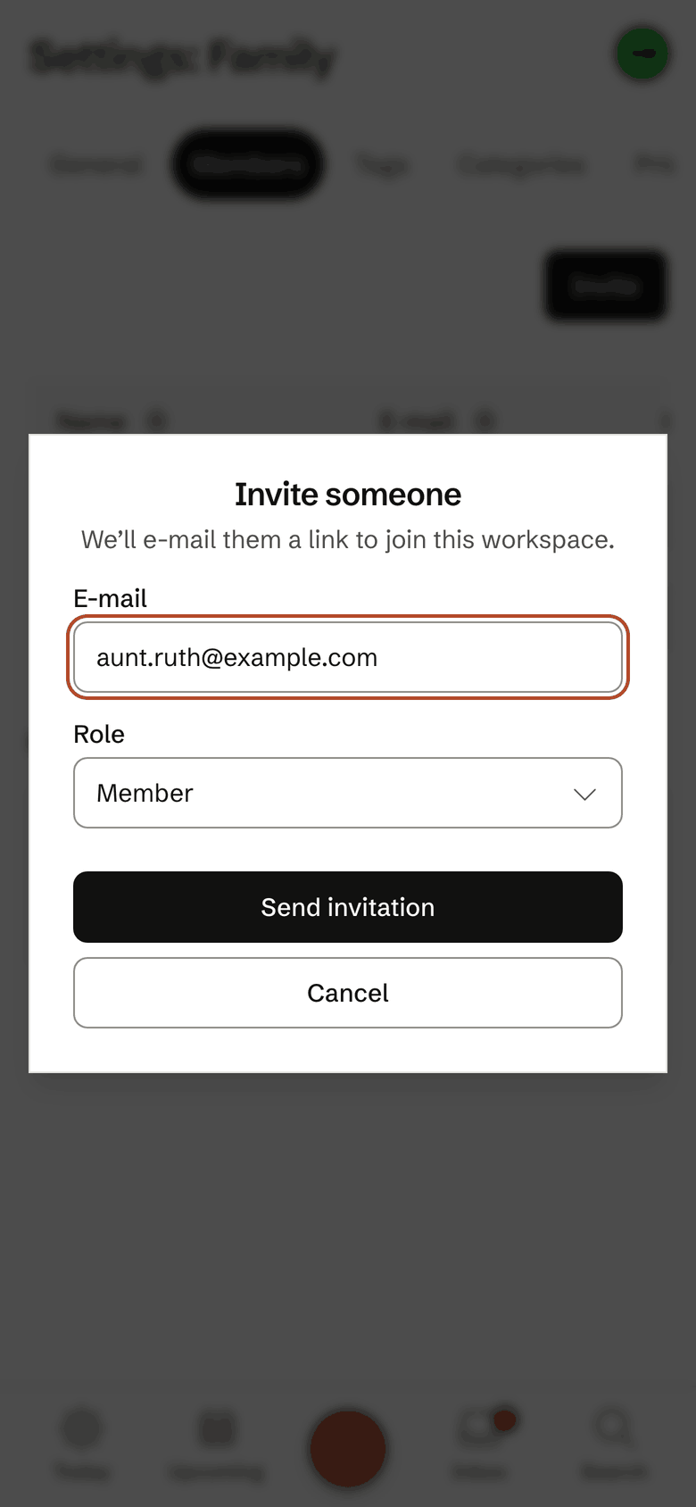 The invitation to the family workspace on the iPhone, ready to send.